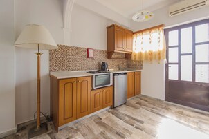 Full-size fridge, stovetop