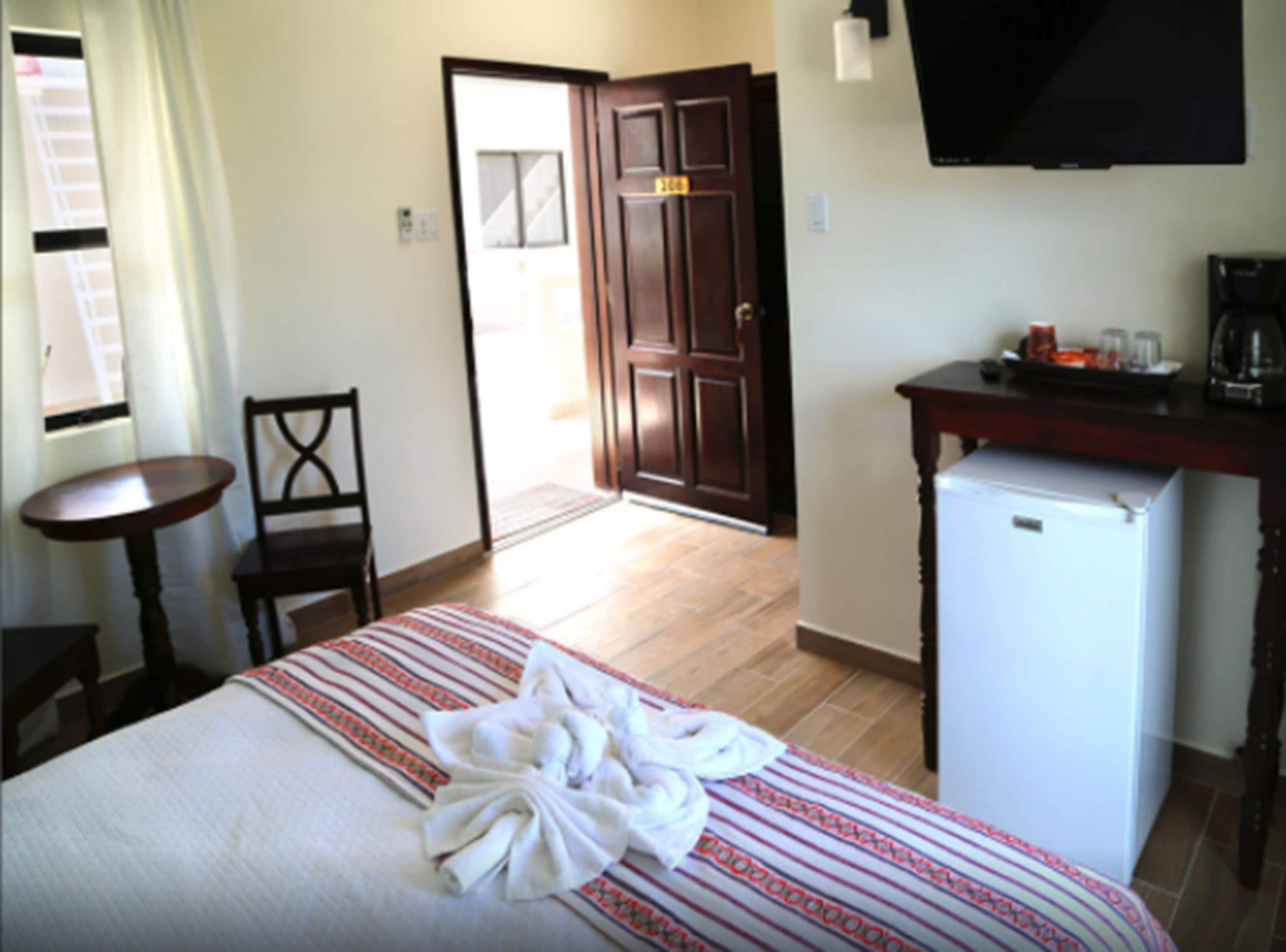 comfort room, 1 queen bed, partial ocean view | 1 bedroom, premium bedding, iron/ironing board, free wifi