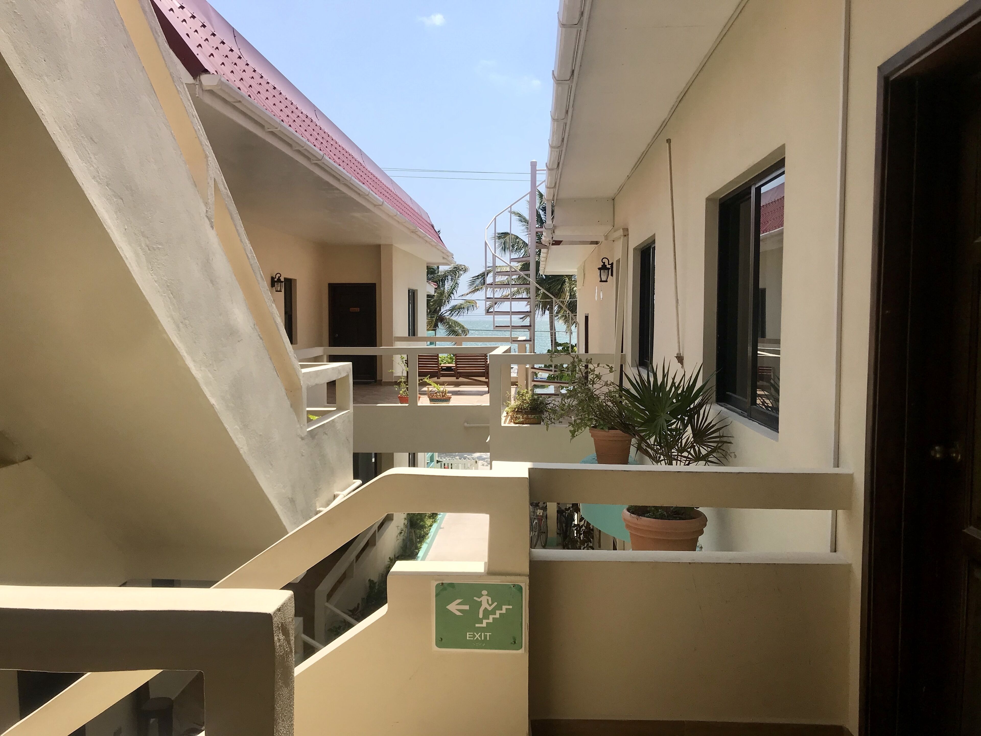 standard triple room, 2 double beds, refrigerator, courtyard area | exterior