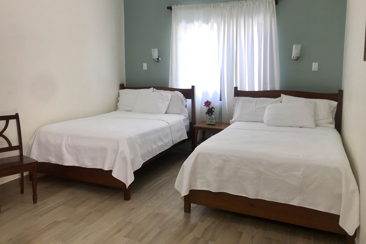 Standard Triple Room, 2 Double Beds, Refrigerator, Courtyard Area