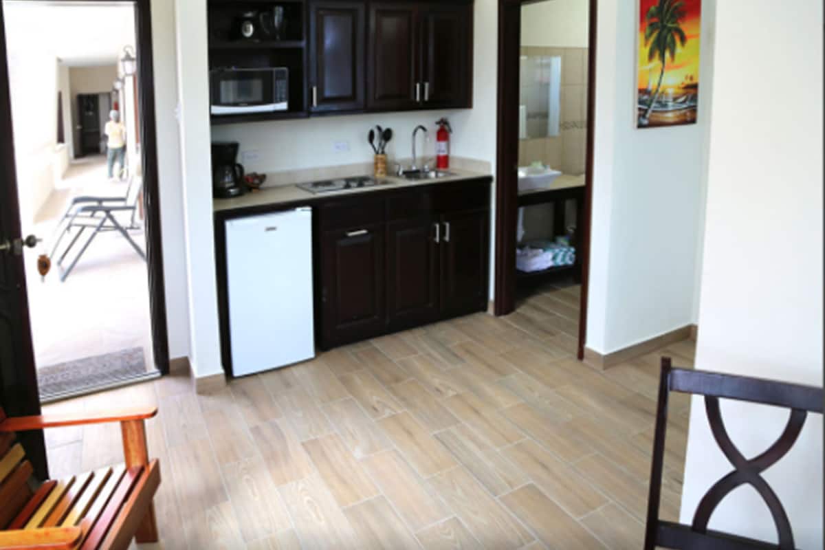 standard studio suite, 1 king bed, beach view, beachfront | private kitchenette | fridge, microwave, coffee/tea maker