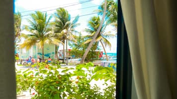 Comfort Room, 1 Queen Bed, Partial Ocean View | Balcony view