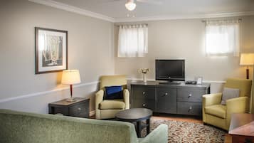 Signature Apartment, 1 Queen Bed, Kitchen | Living room | Flat-screen TV