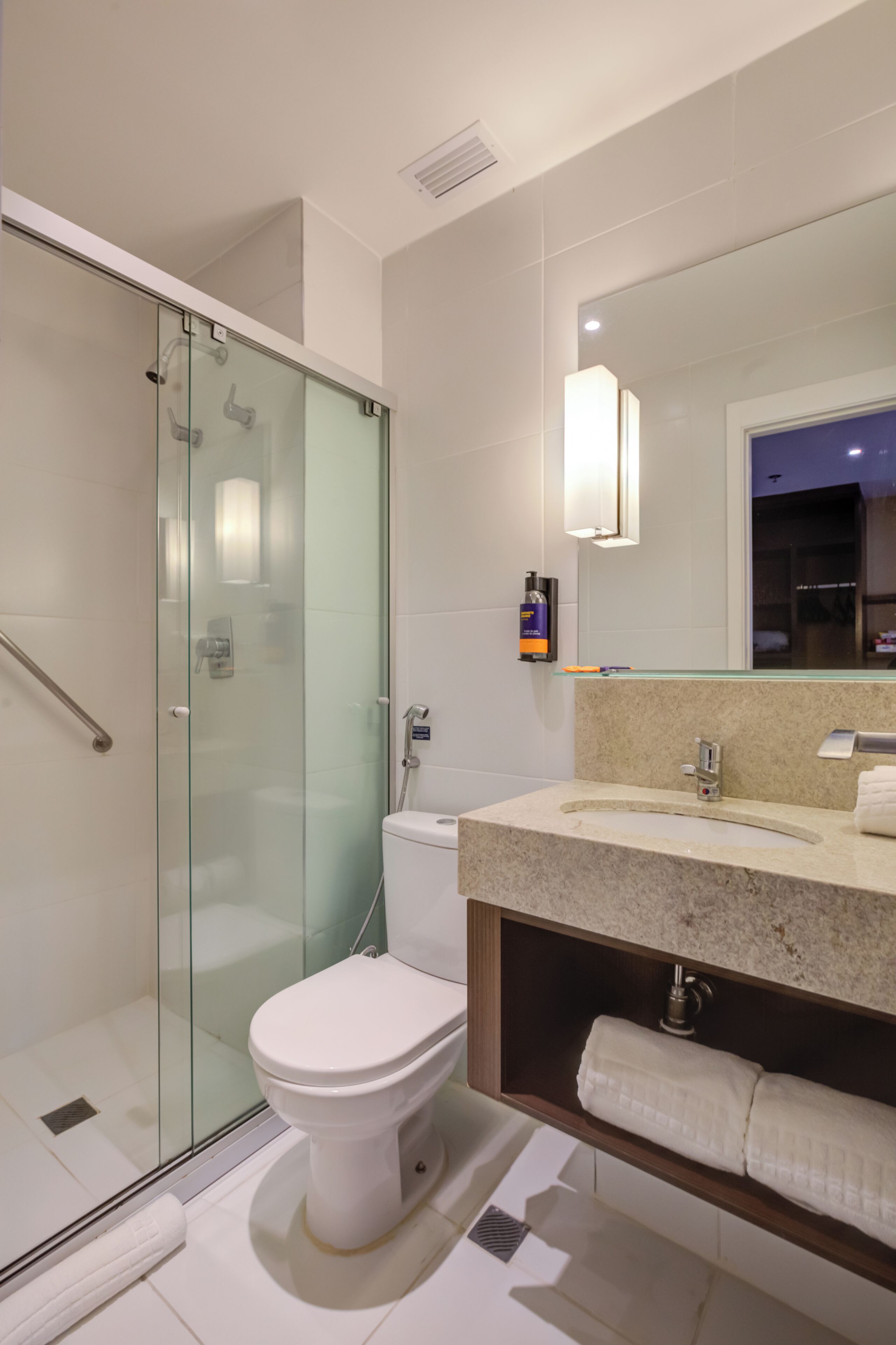 deluxe double room | bathroom | shower, hair dryer, towels