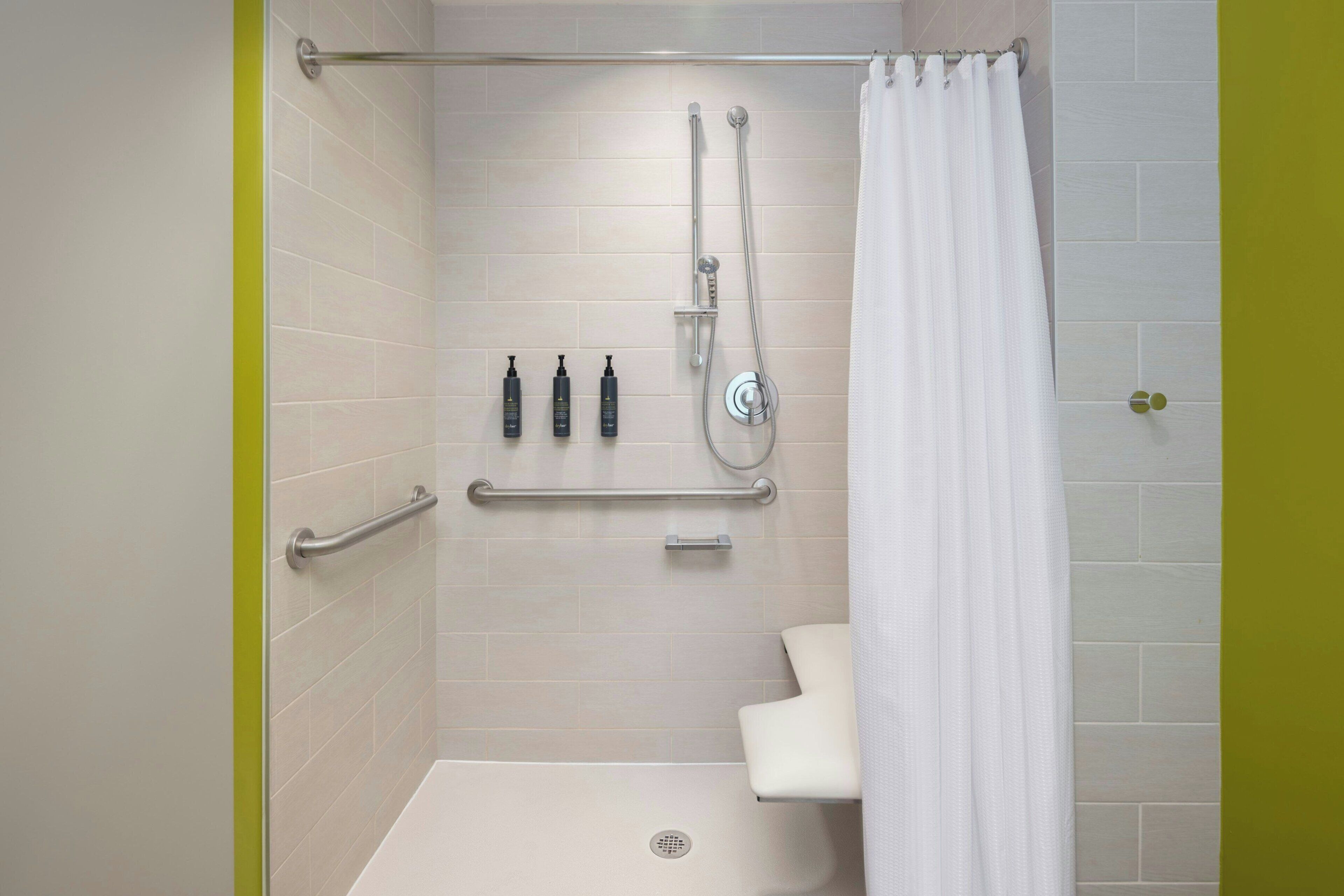 shower, free toiletries, hair dryer, towels