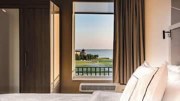 Premium bedding, desk, laptop workspace, iron/ironing board