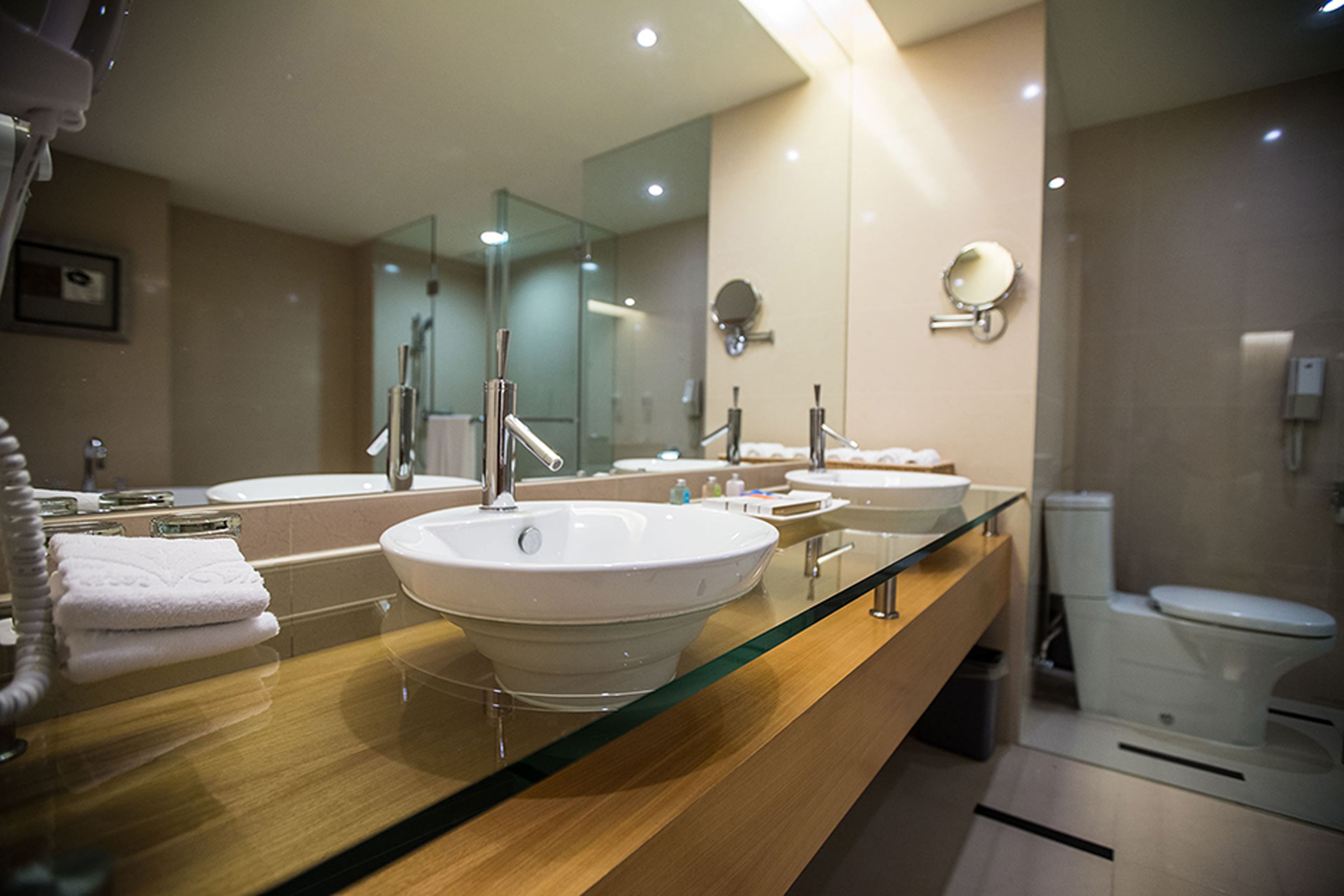 deluxe quadruple room, multiple beds | bathroom sink