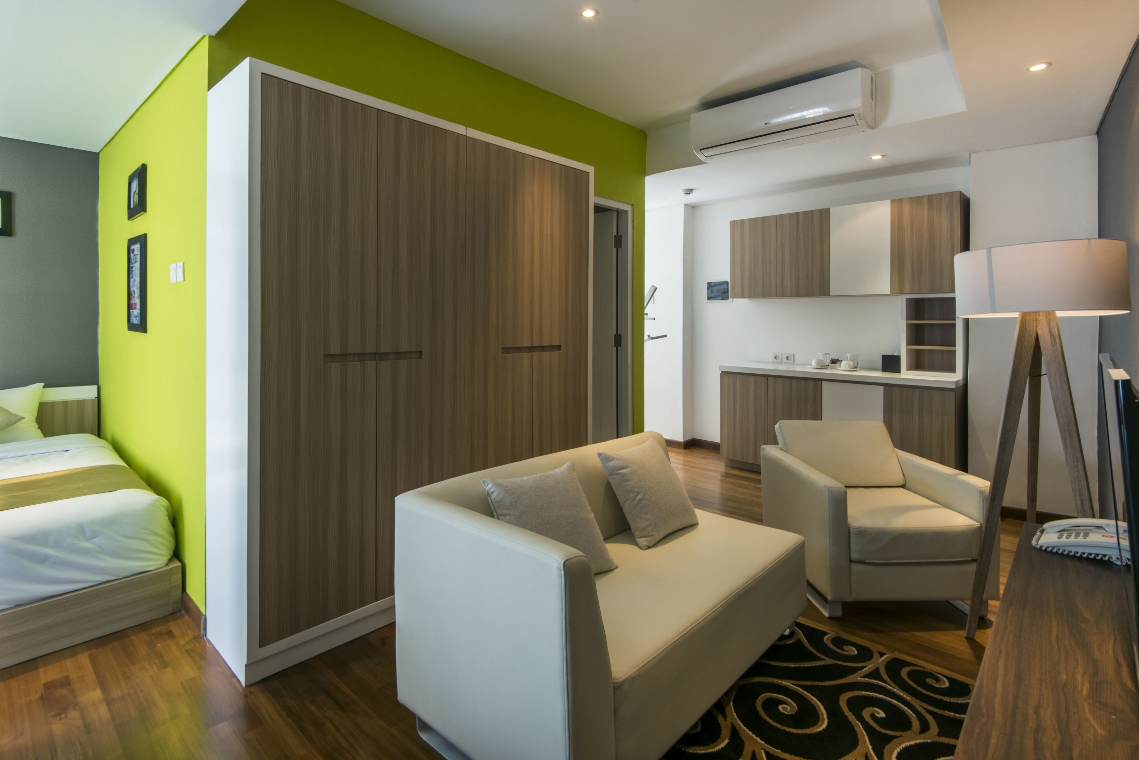 family room | in-room safe, individually decorated, desk, iron/ironing board