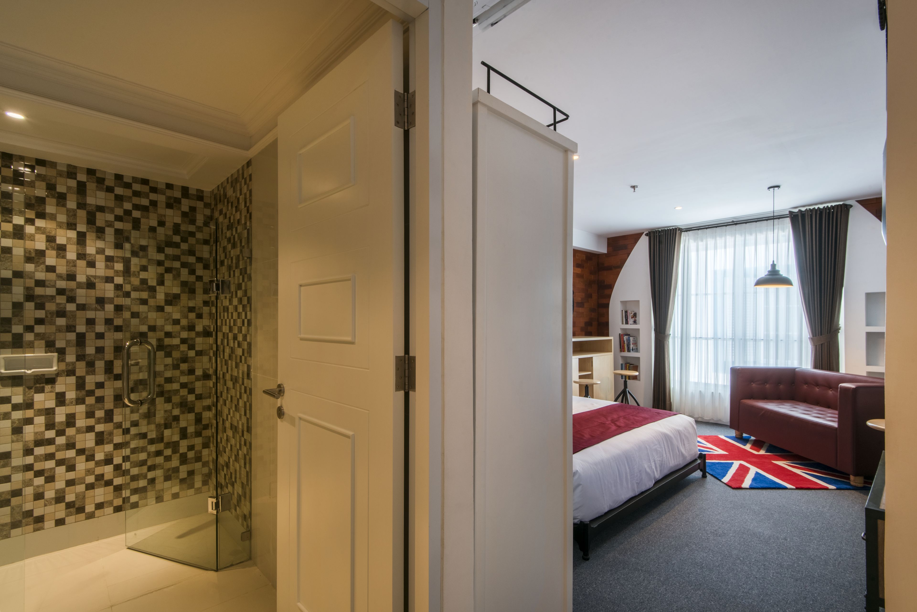 deluxe room - bachelor’s pad | in-room safe, individually decorated, desk, iron/ironing board