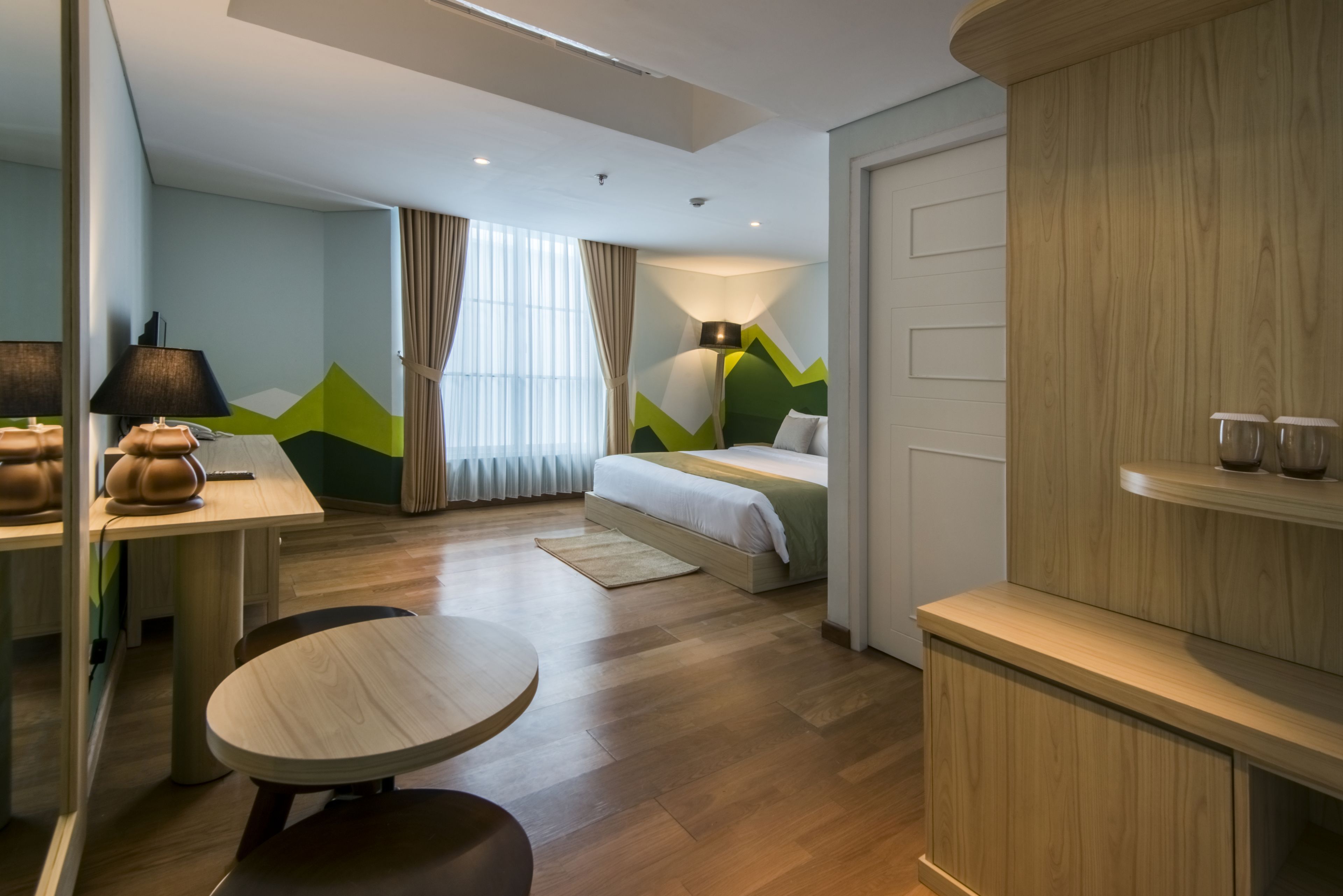 premier room - serenity | in-room safe, individually decorated, desk, iron/ironing board