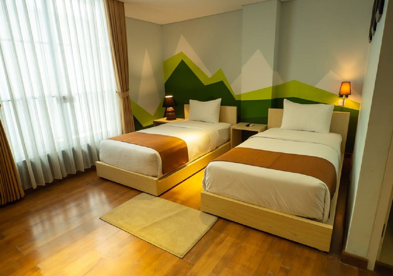 premier room - serenity | in-room safe, individually decorated, desk, iron/ironing board