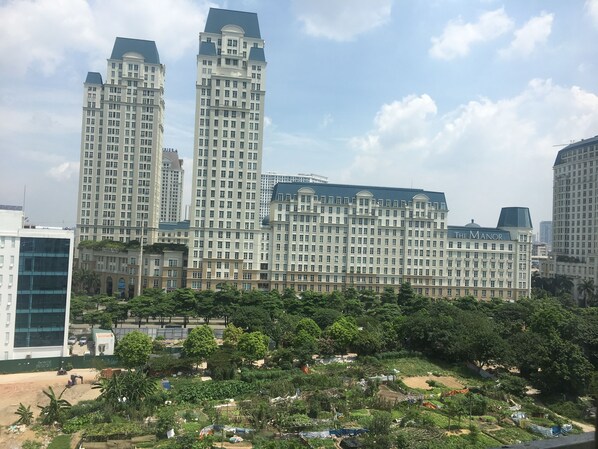 A high-rise hotel with multiple floors and a prominent entrance.