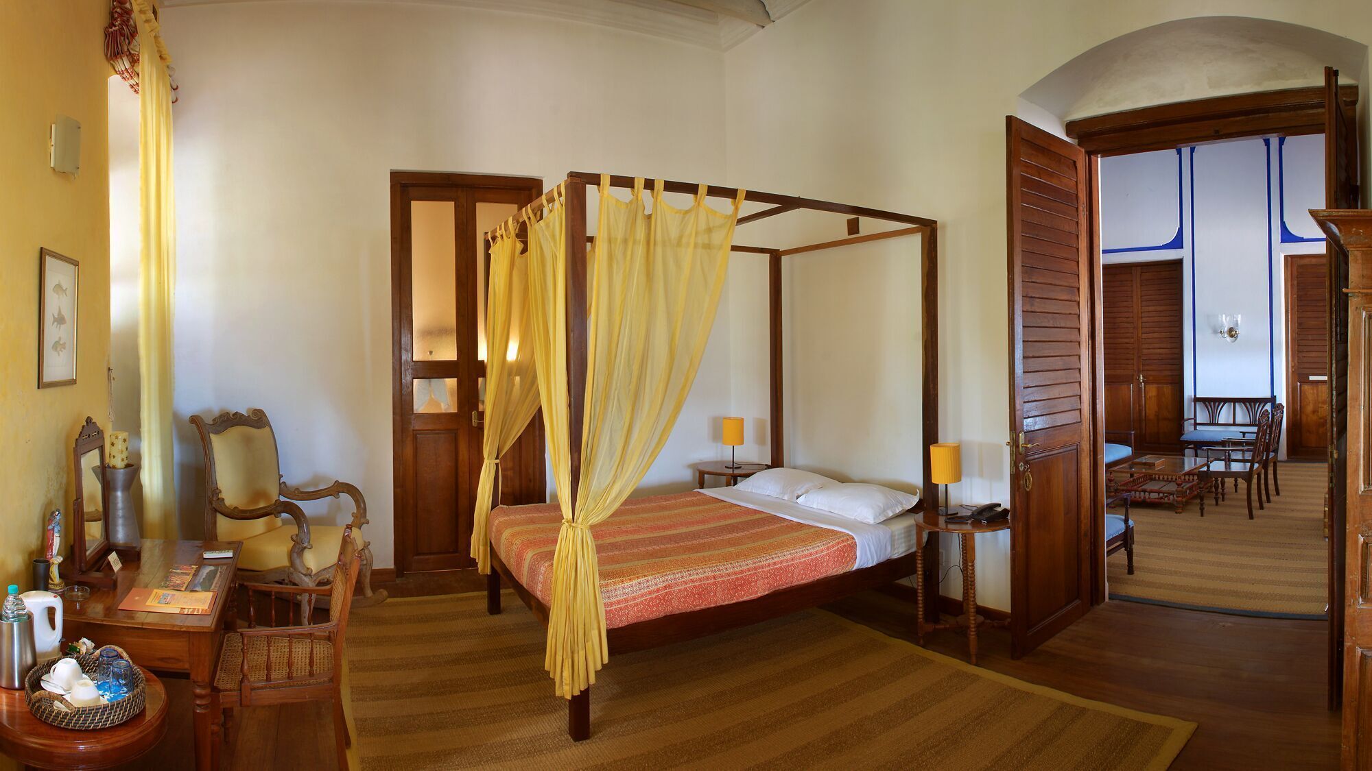 Minibar, desk, bed sheets