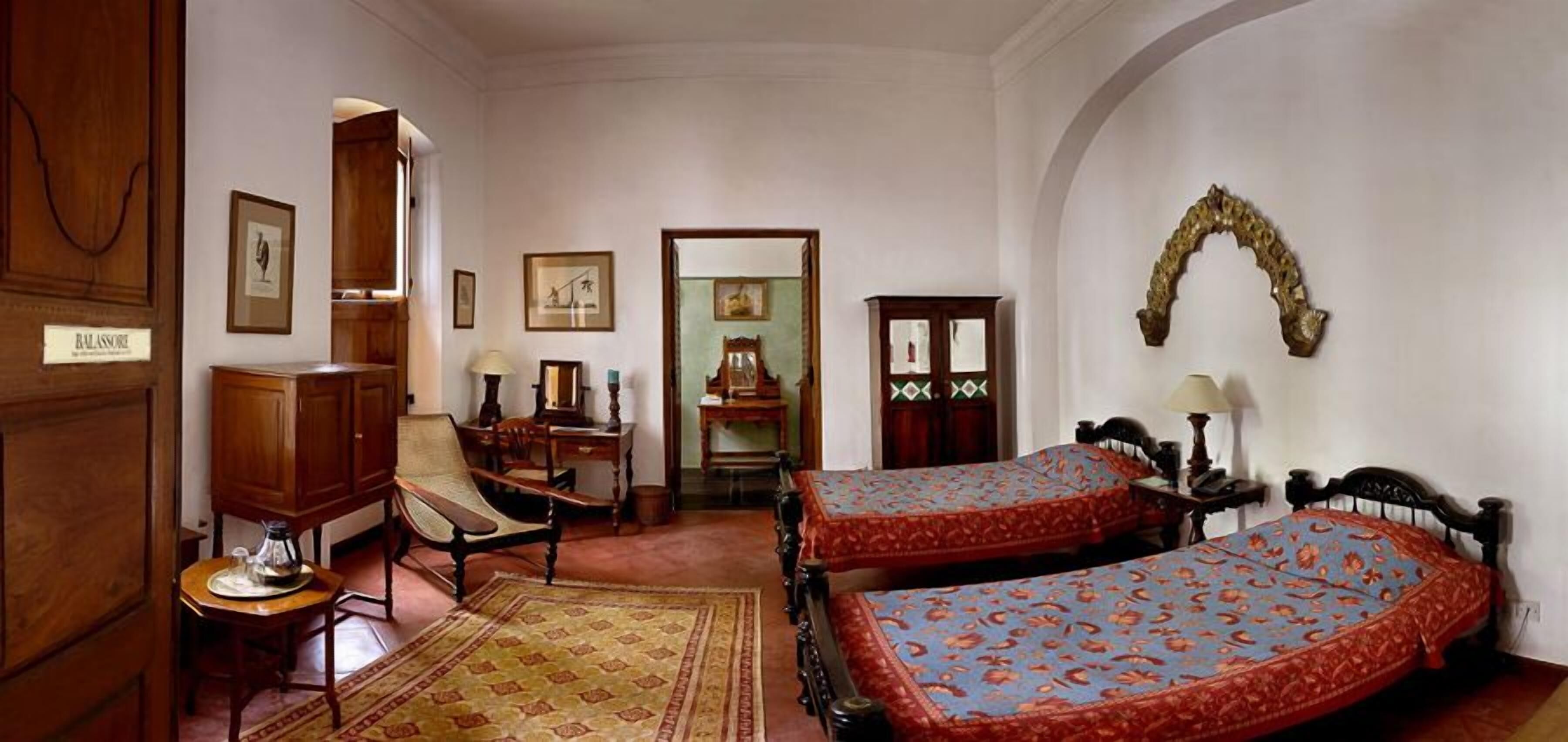 Minibar, desk, bed sheets