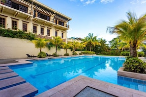 Outdoor pool, pool umbrellas, sun loungers