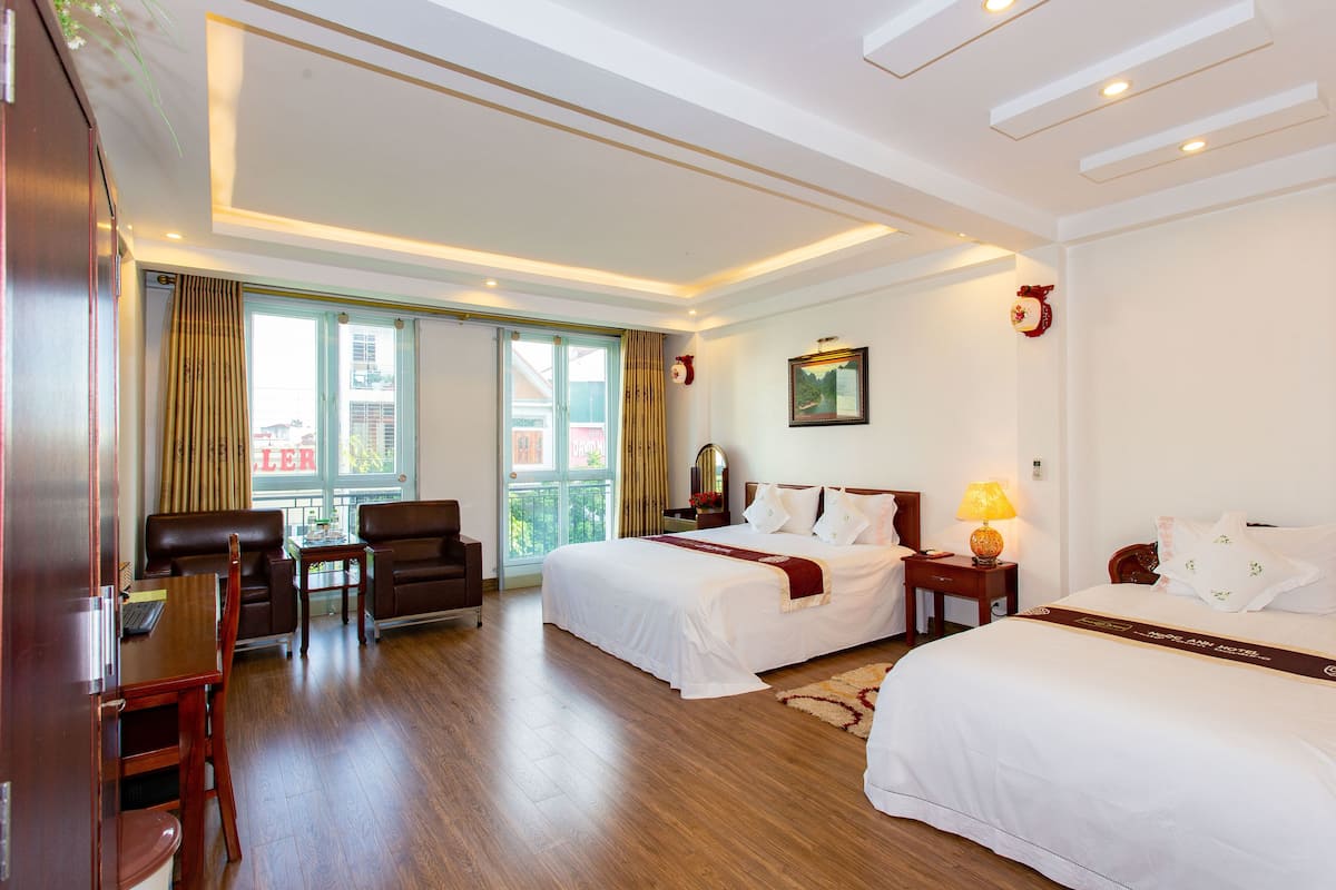 Kamar Keluarga (Executive) | Seprai premium, busa memori, isi minibar gratis, dan brankas