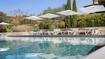 Outdoor pool, pool umbrellas, pool loungers
