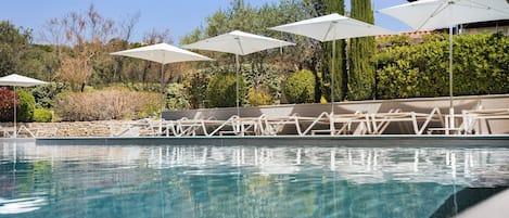 Outdoor pool, pool umbrellas, sun loungers
