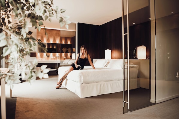 Ropa de cama de alta calidad, colchones con acolchado adicional, minibar