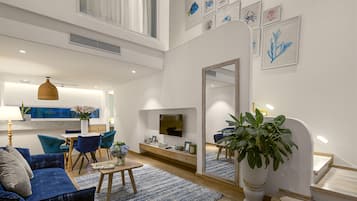Duplex Residence Balcony Pool view | Living area | 40-inch TV with cable channels