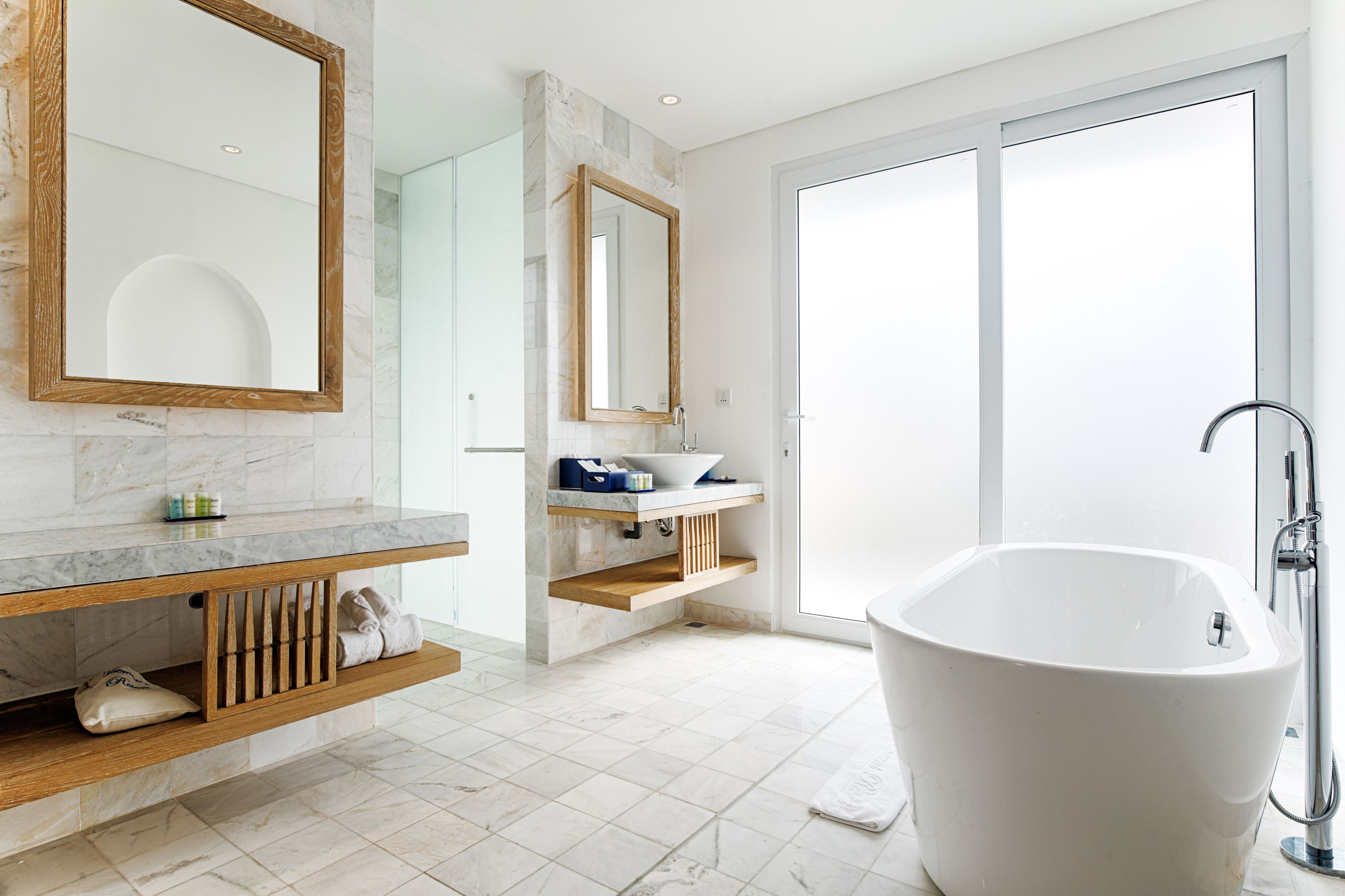 junior suite twin room, balcony, pool view | bathroom | shower, rainfall showerhead, hair dryer, slippers