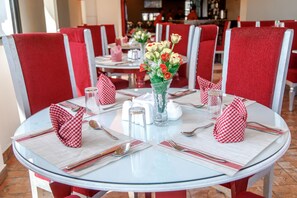 Breakfast, lunch, dinner served; local and international cuisine 