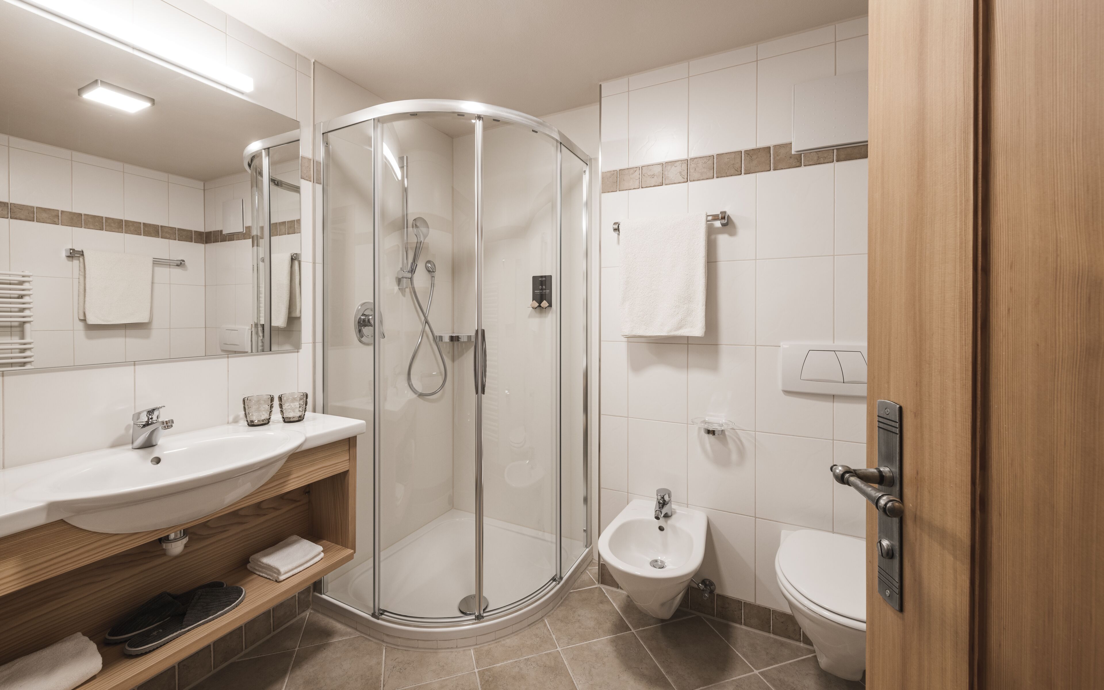 double room (mountain classic) | bathroom | shower, free toiletries, hair dryer, bathrobes