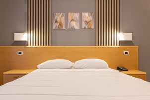 1 多间卧室、高档床上用品、羽绒被、迷你吧