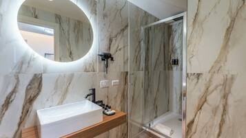 Deluxe Room | Badezimmer