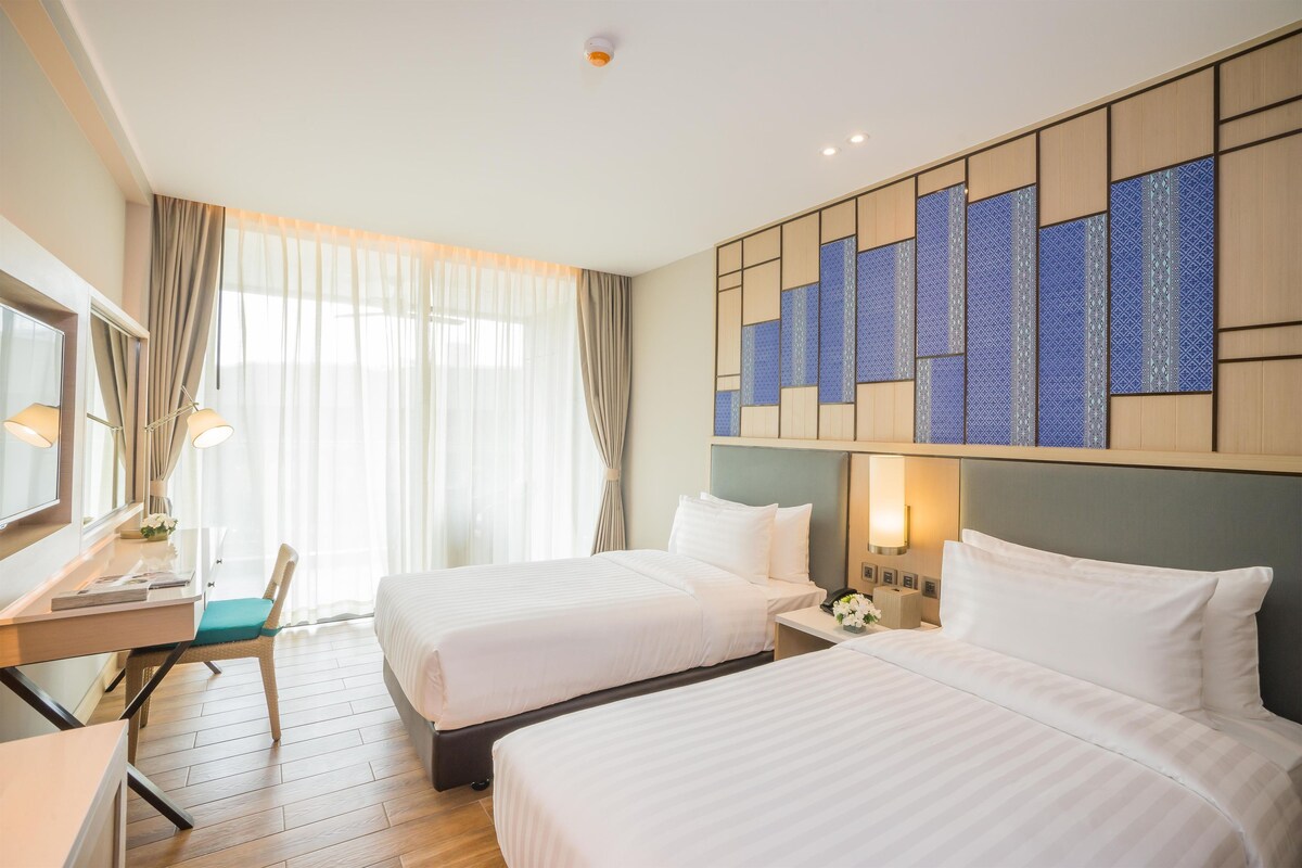 AVANI Deluxe Room | Premium bedding, Select Comfort beds, in-room safe, desk