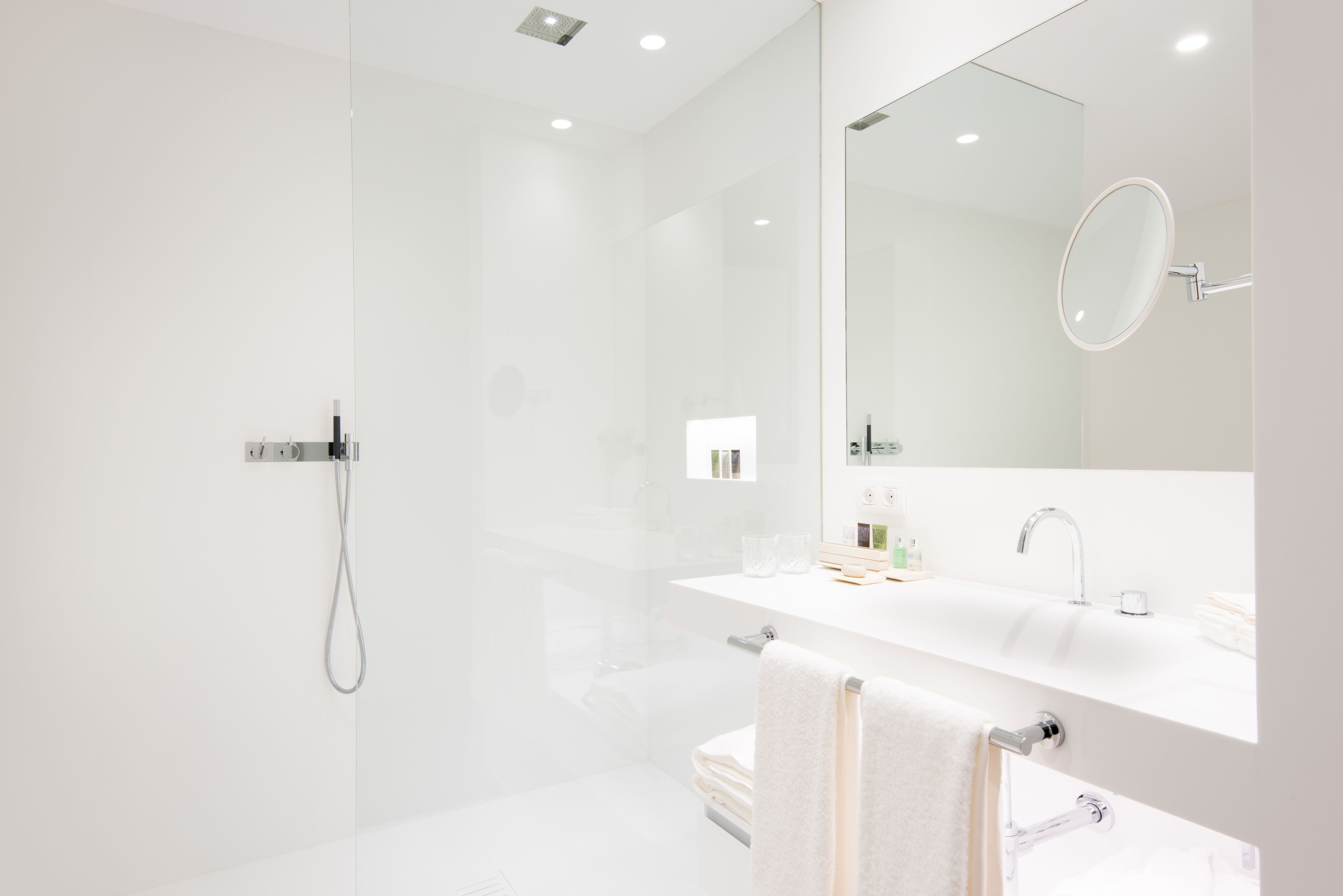 junior suite | bathroom | designer toiletries, hair dryer, bathrobes, slippers