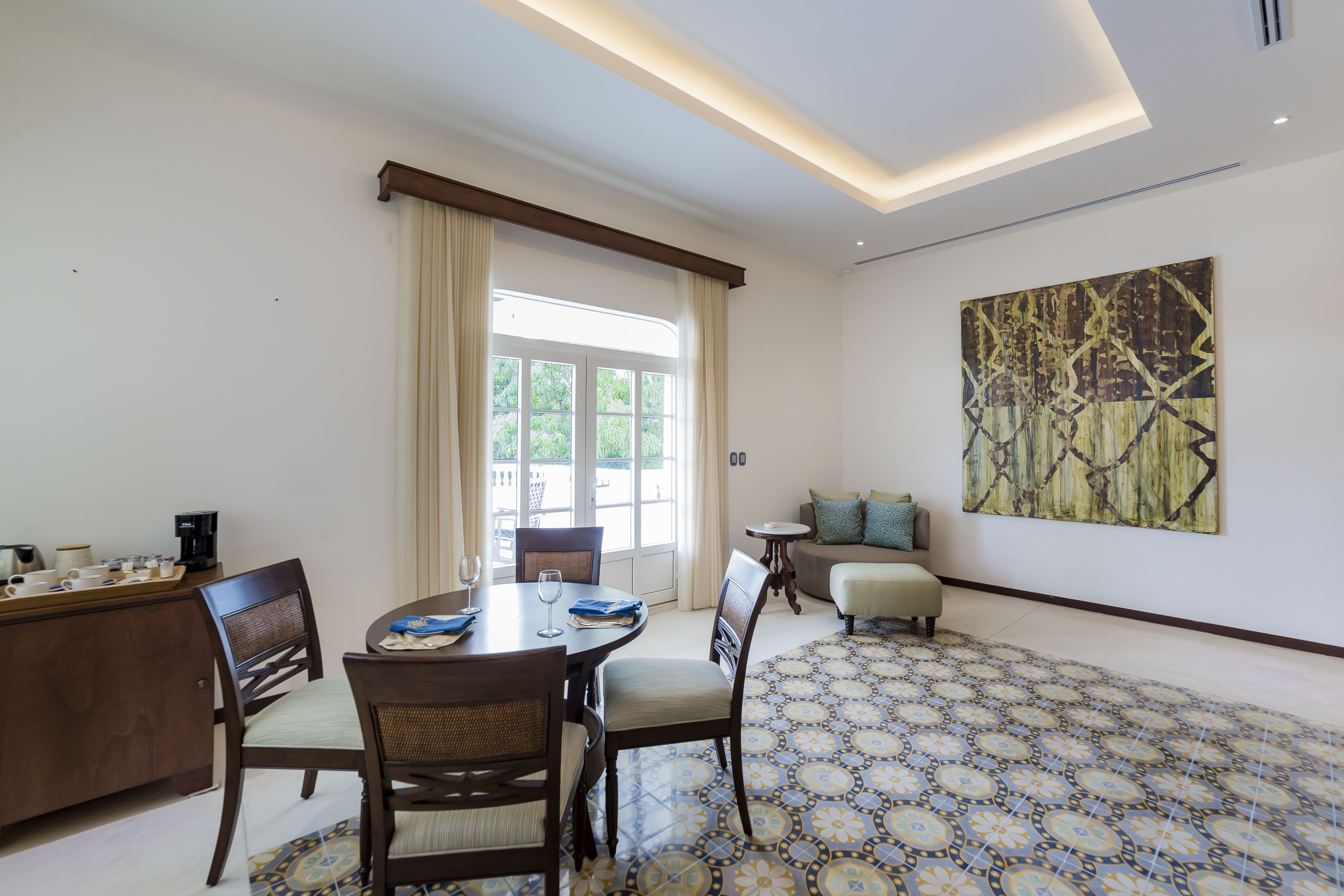 deluxe suite (private terrace) | living area | 50-inch led tv with satellite channels, tv, netflix