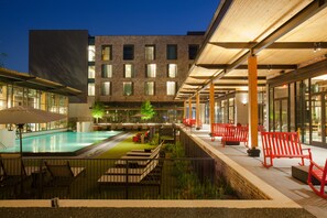 Outdoor pool, pool umbrellas, pool loungers - The George, by Valencia Hotel Collection (College Station)