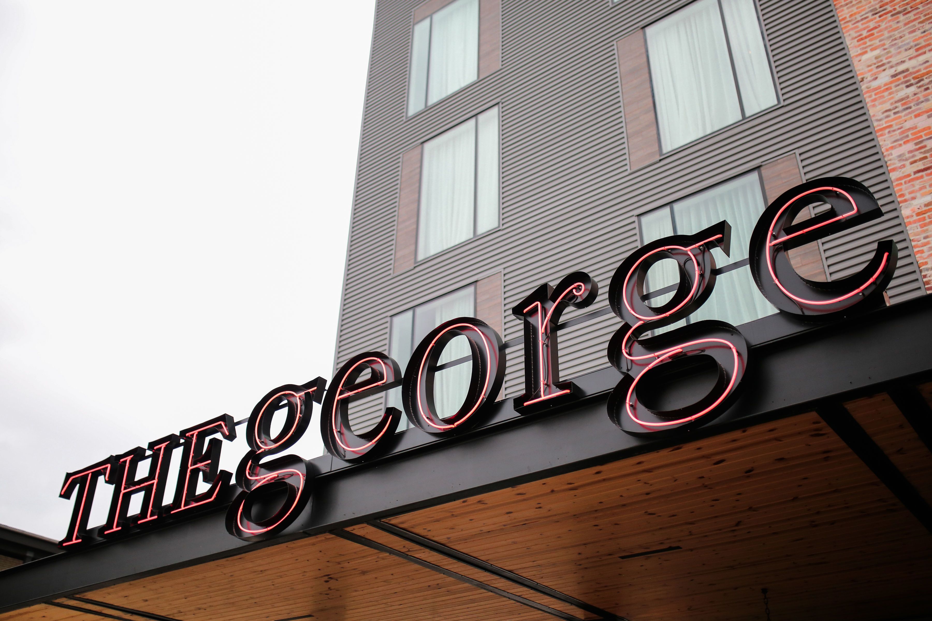 A building with a sign that reads "THE GEORGE".