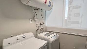 Business Apartment, 4 Bedrooms | Bathroom | Combined shower/tub, free toiletries, hair dryer, towels