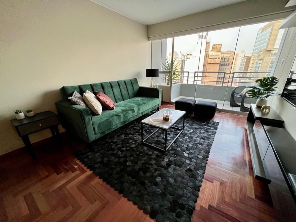 Business Apartment, 4 Bedrooms | Living area | 32-inch LED TV with cable channels, TV
