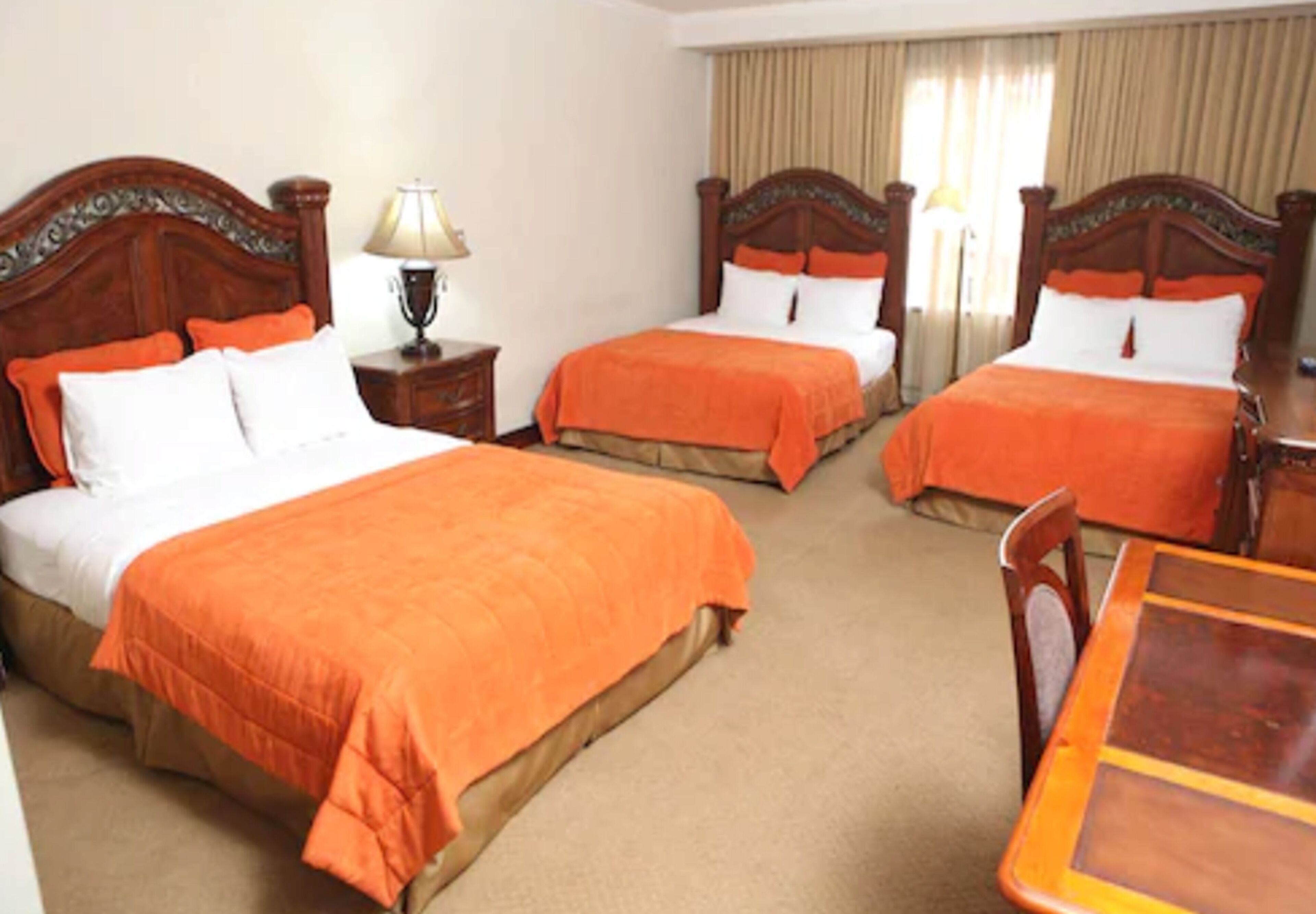 junior suite, multiple beds | premium bedding, in-room safe, individually decorated, desk
