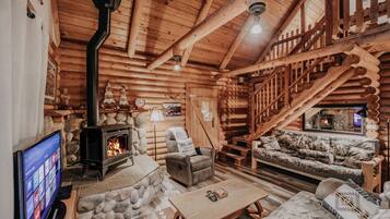 Cabaña, 2 habitaciones | Área de sala de estar | Reproductor de DVD