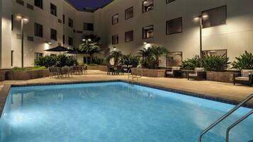 Outdoor pool, open 8:00 AM to 10:00 PM, pool loungers