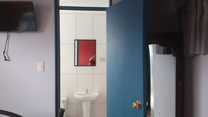 Single Room | Bathroom | Shower, free toiletries, towels