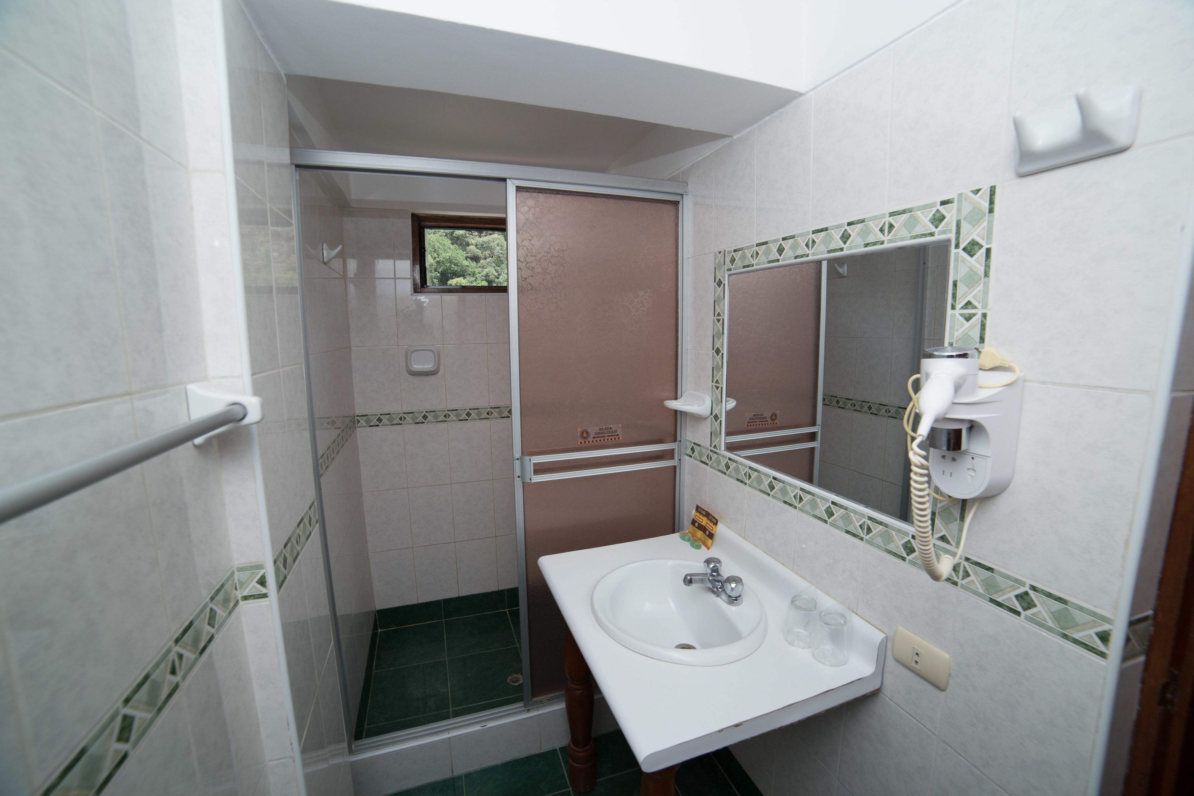 triple room | bathroom | shower, hair dryer, towels
