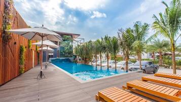 Outdoor pool, pool umbrellas, sun loungers