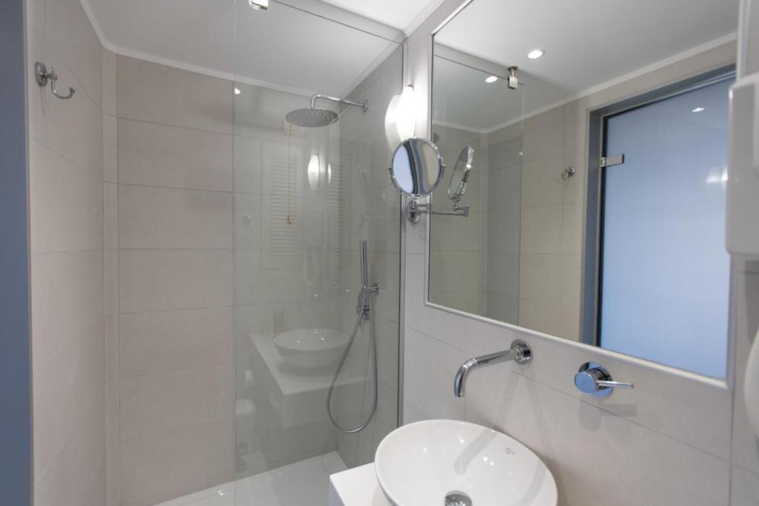 shower, free toiletries, hair dryer, bathrobes