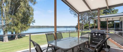 Deluxe Waterfront Cabin | Terrace/patio