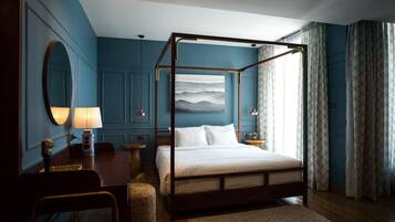 Family Triple Room | Free minibar, desk, laptop workspace, blackout curtains