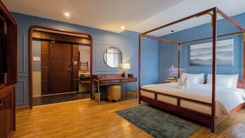Family Triple Room | Free minibar, desk, laptop workspace, blackout drapes
