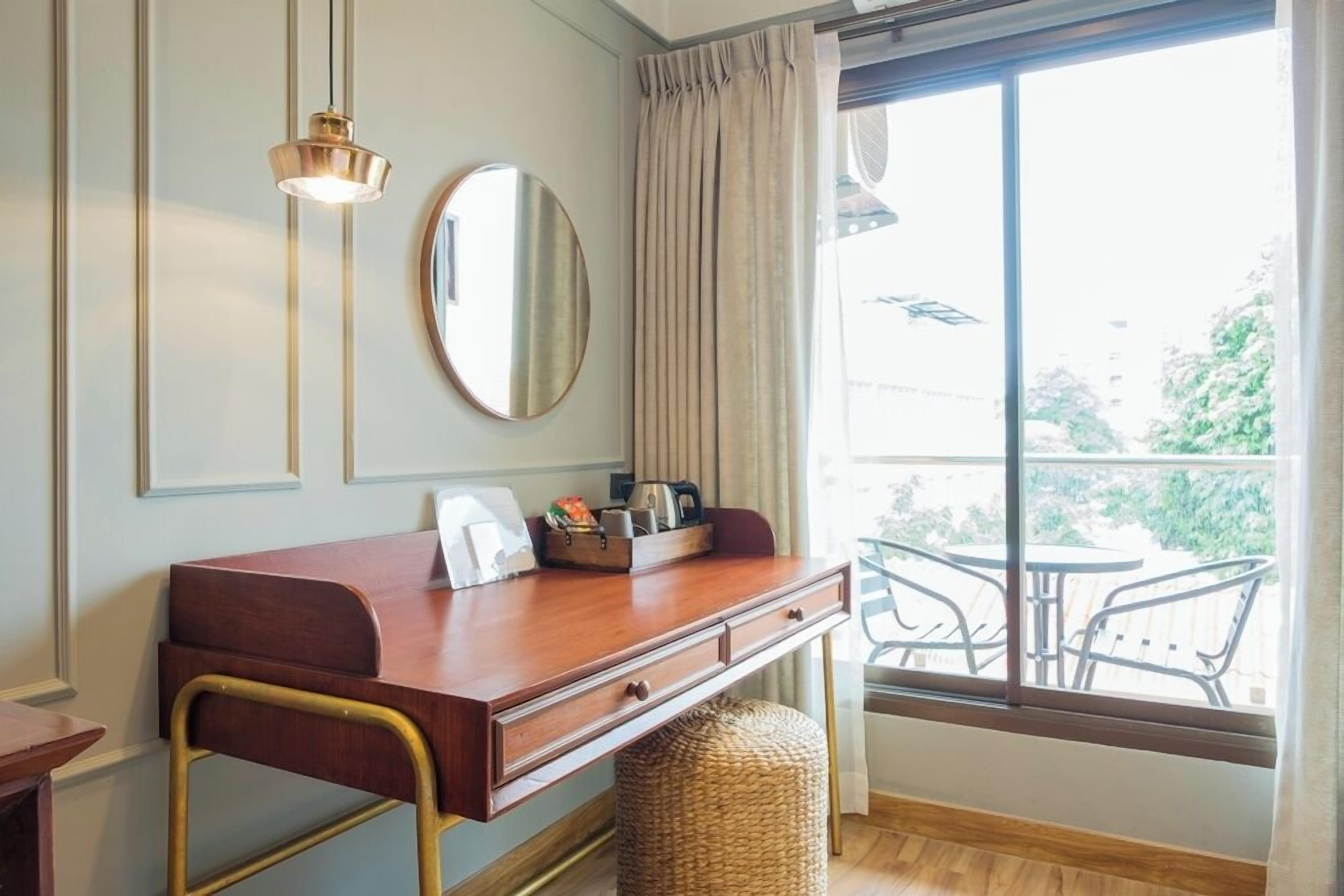 deluxe double room | free minibar, desk, laptop workspace, blackout curtains