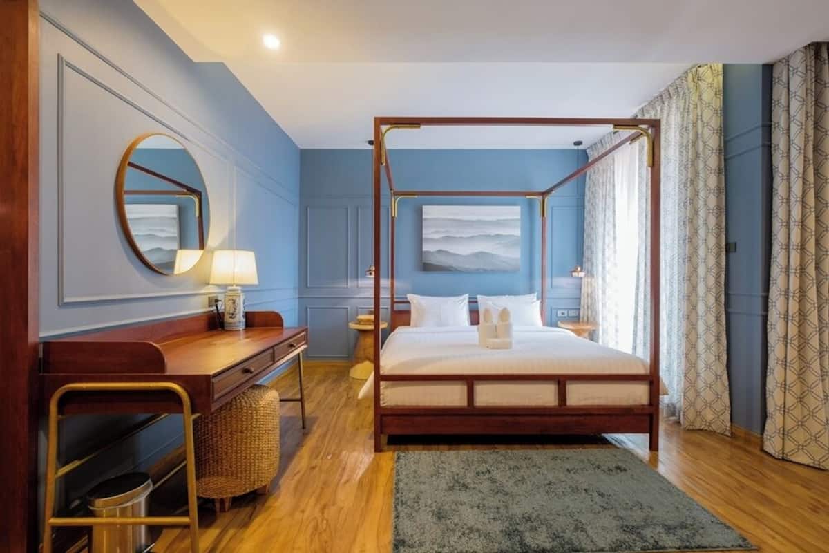 Family Triple Room | Free minibar, desk, laptop workspace, blackout drapes