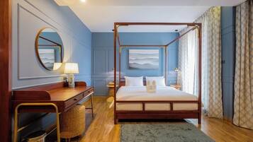 Family Triple Room | Free minibar, desk, laptop workspace, blackout drapes