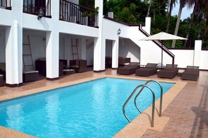 Outdoor pool, pool umbrellas, pool loungers